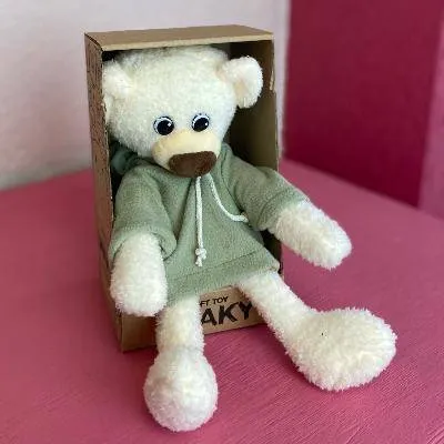 Мягкая игрушка "Медвежонок Ермак белый в толстовке хаки" 21/30 см